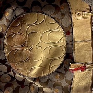 Beautiful auth Coach purse/ original card. Brown, Gold & splash of red hearts.